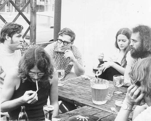 A Saturday afternoon at the Quiet Man pub in Dallas circa 1970. The author is the fellow in the center with horn-rimmed spectacles and a civilized haircut.